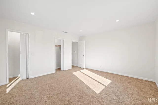 an empty room with an entryway