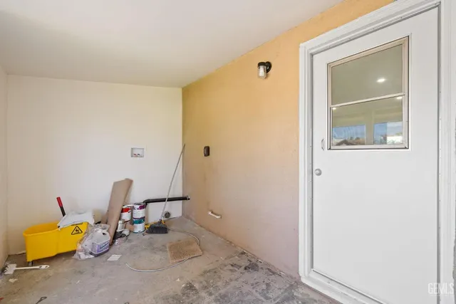 a view of storage and utility room with toys