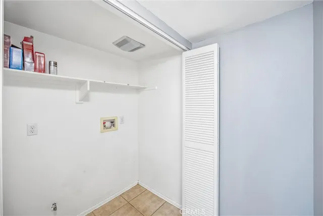a bathroom with a sink vanity and a mirror