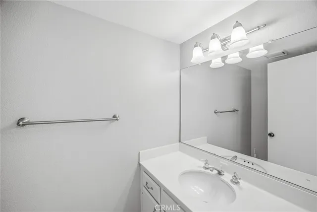 a view of entryway and hall with a front door