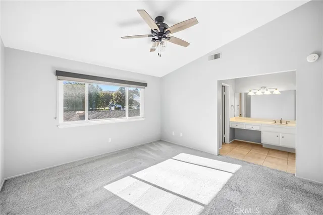 a view of a livingroom with a ceiling fan