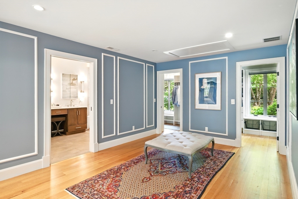 104 Ardsley Road Longmeadow, MA 01106 - Photo 18 of 42 a room with a bed and glass door