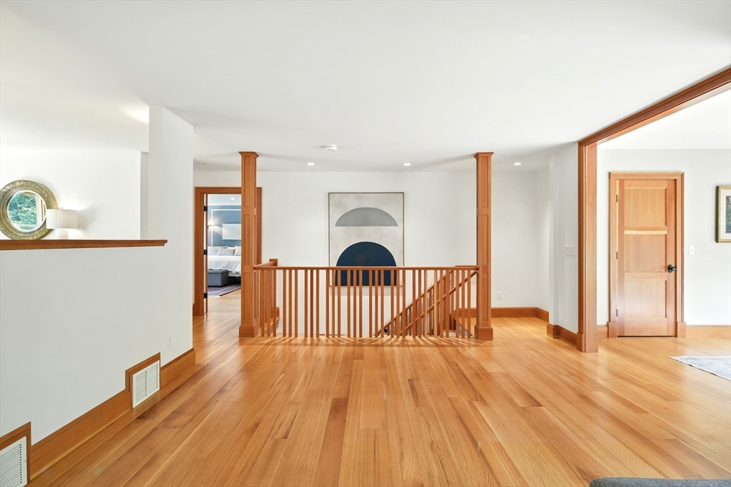 104 Ardsley Road Longmeadow, MA 01106 - Photo 4 of 42 a view of a living room with wooden floor and furniture