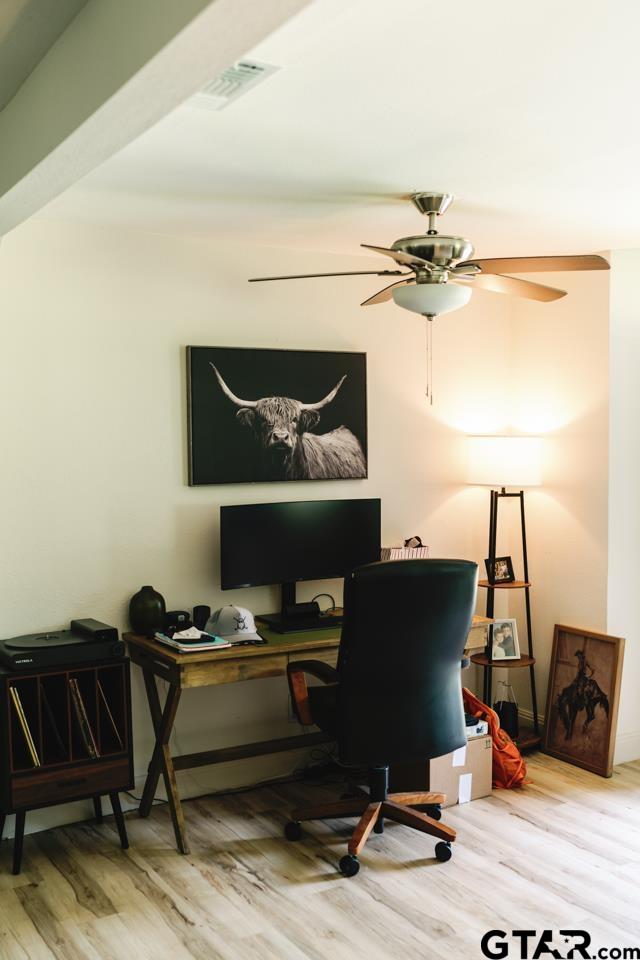 2411 Rodge Drive Tyler, TX 75701 - Photo 13 of 42 a bedroom with a bed and a chandelier
