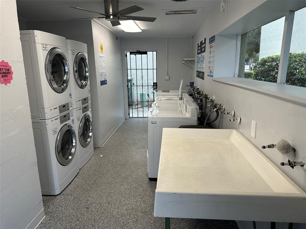 525 South Conway Road, Unit 109 Orlando, FL 32807 - Photo 15 of 18 a living room with furniture and a fireplace
