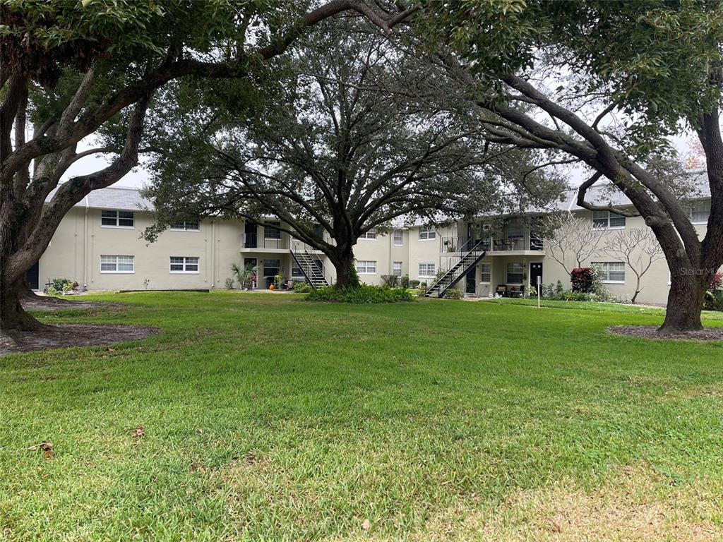 525 South Conway Road, Unit 109 Orlando, FL 32807 - Photo 16 of 18 a house view with garden space