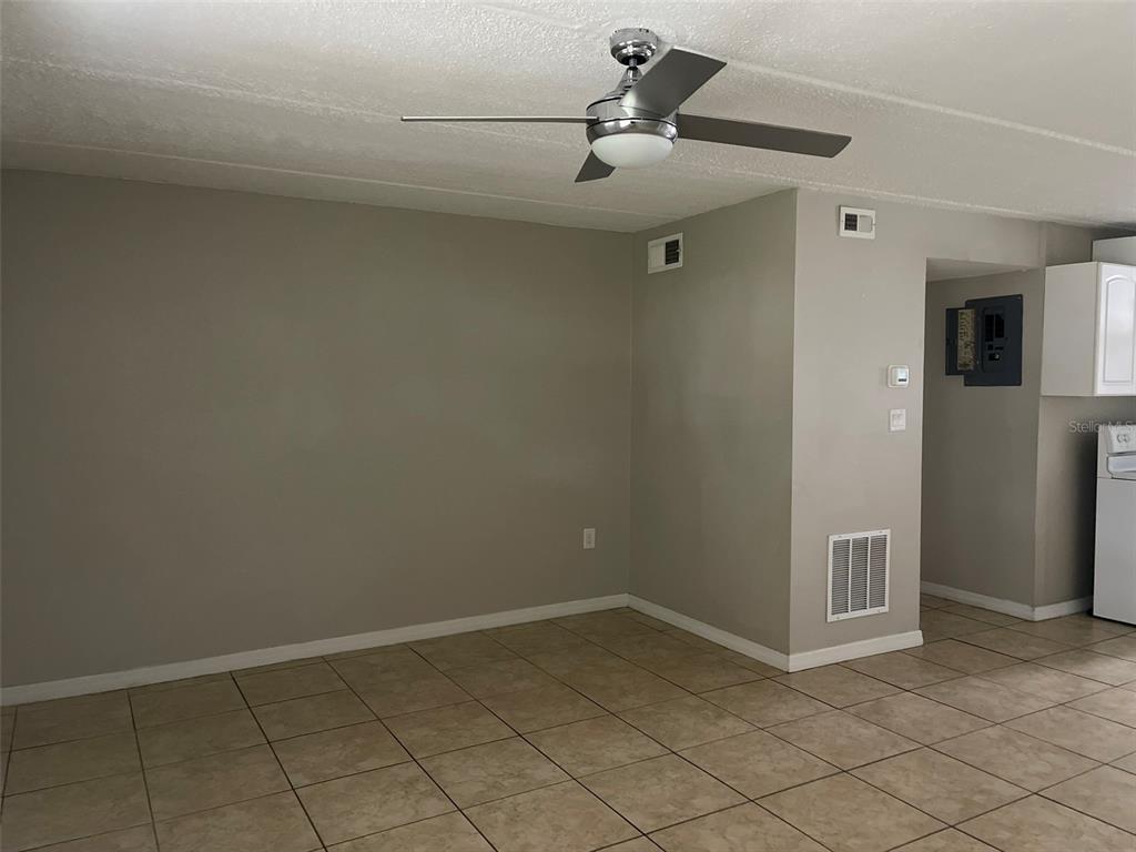 525 South Conway Road, Unit 109 Orlando, FL 32807 - Photo 6 of 18 a view of an empty room