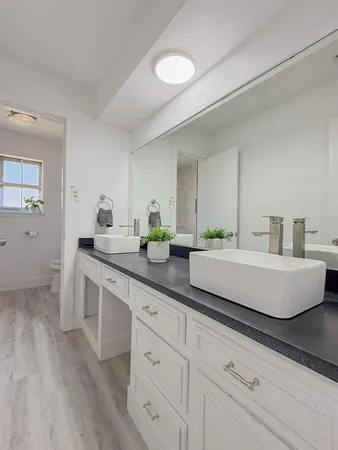 a bathroom with a bathtub and a toilet