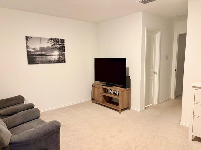 464 Reverie Way Ferris, TX 75125 - Photo 8 of 21 a living room with furniture and a flat screen tv