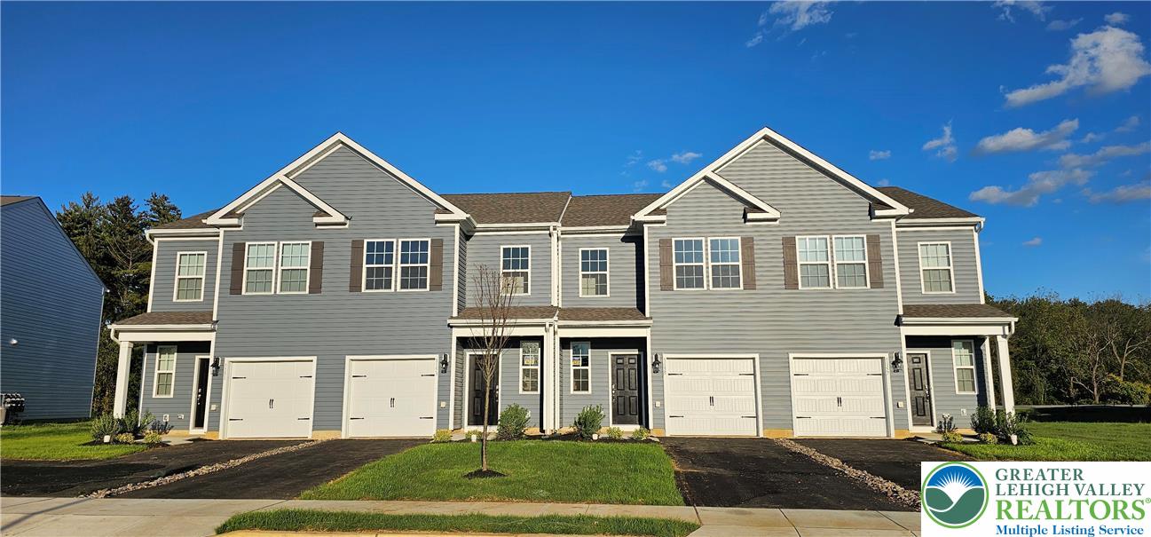 1151 Martin Road Breinigsville, PA 18031 - Photo 1 of 15 a front view of a house with a yard