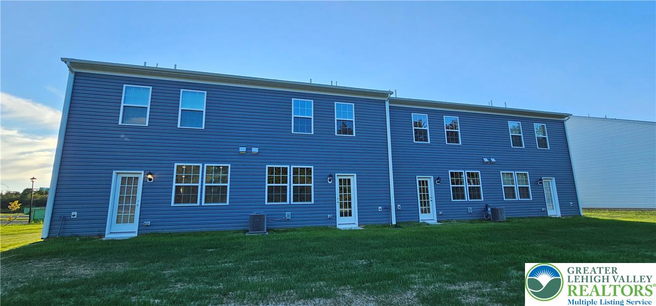1151 Martin Road Breinigsville, PA 18031 - Photo 15 of 15 a view of a brick house with a yard
