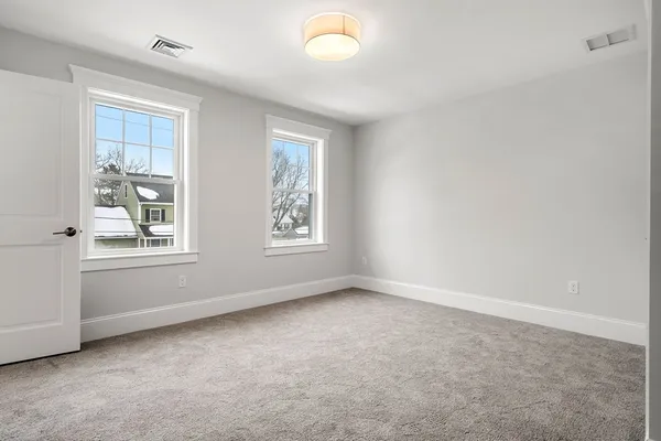 an empty room with windows