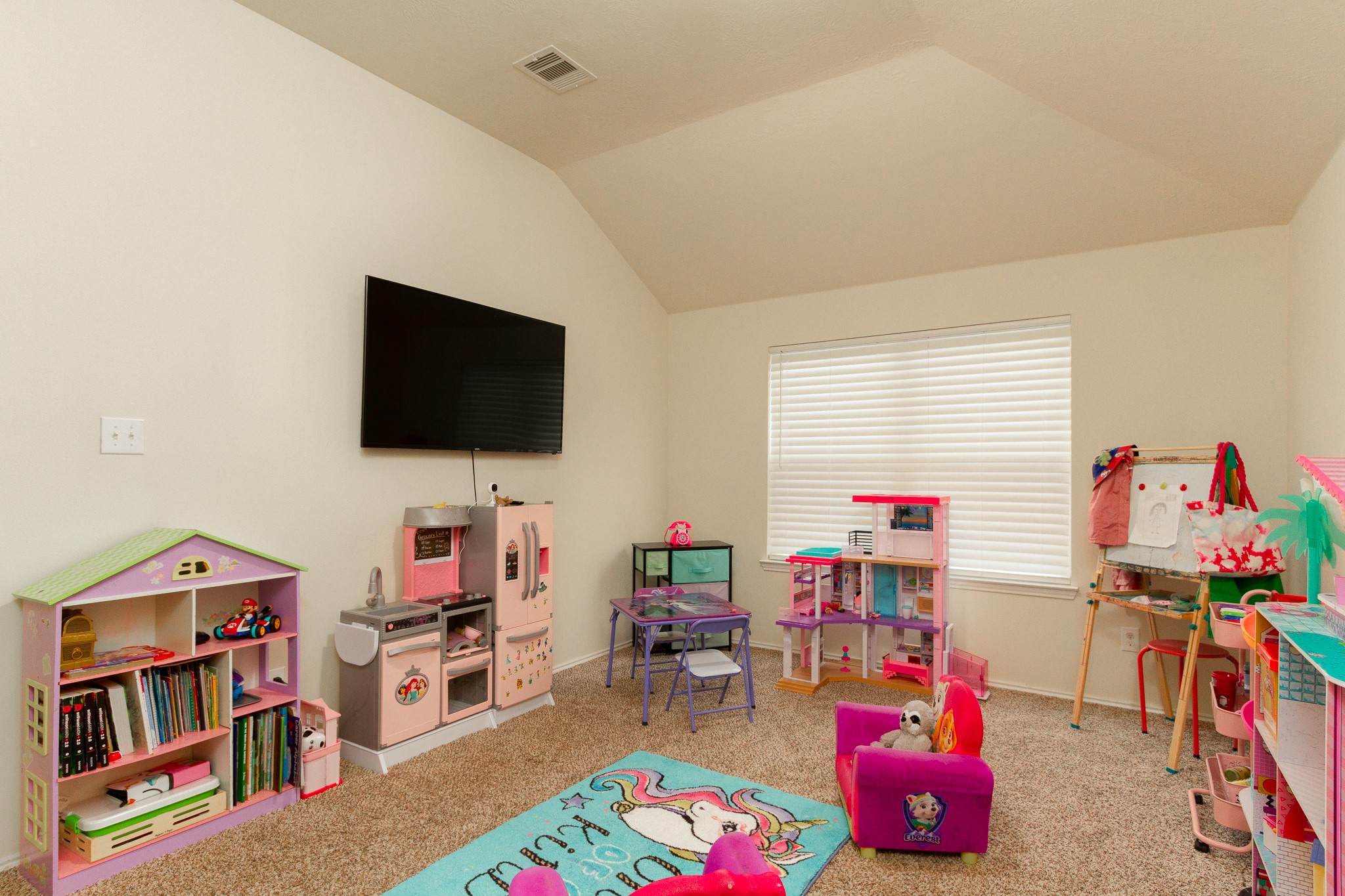 1107 Arum Road Missouri City, TX 77489 - Photo 11 of 23 a living room with furniture and a flat screen tv