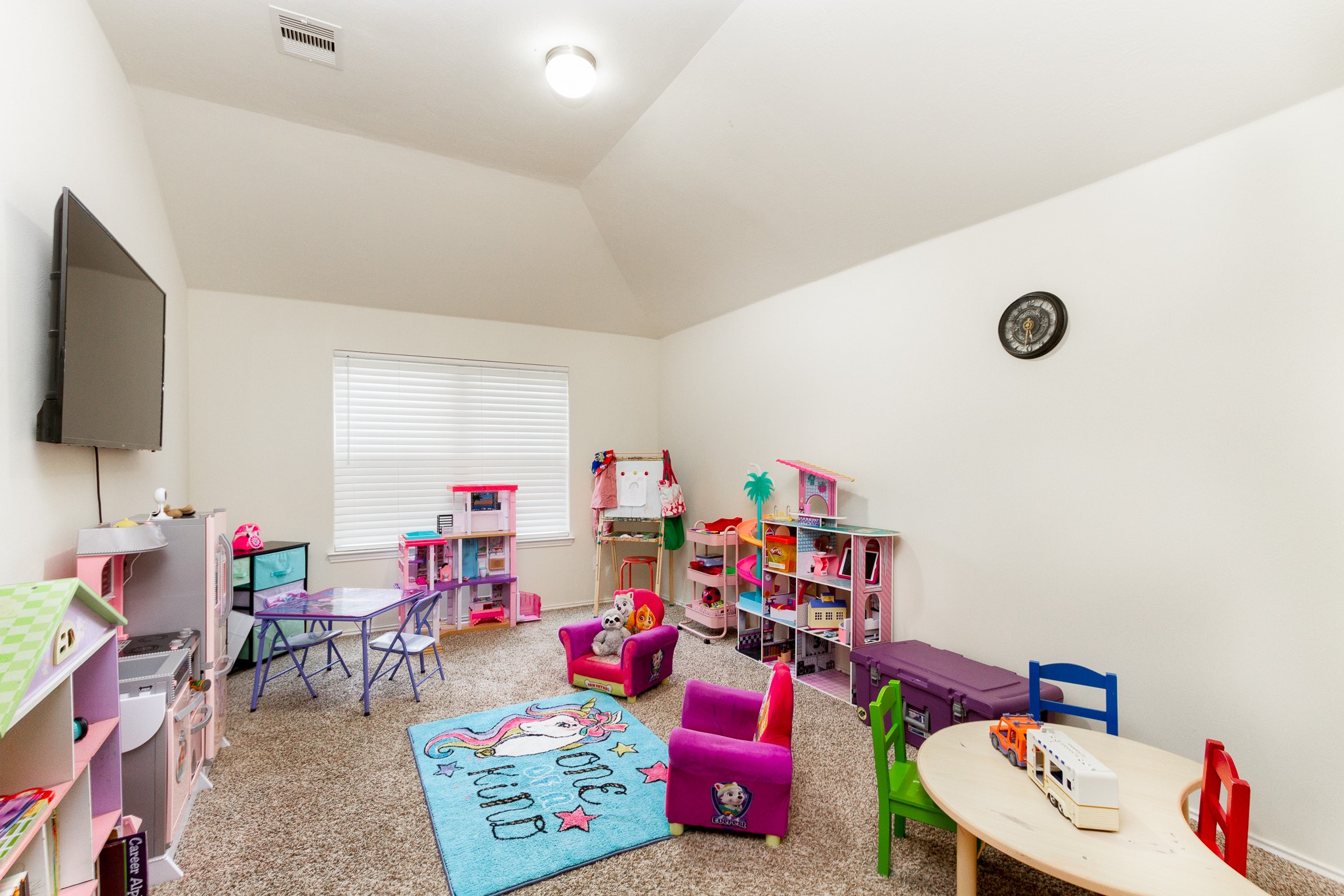 1107 Arum Road Missouri City, TX 77489 - Photo 12 of 23 a bed room with furniture and a flat screen tv