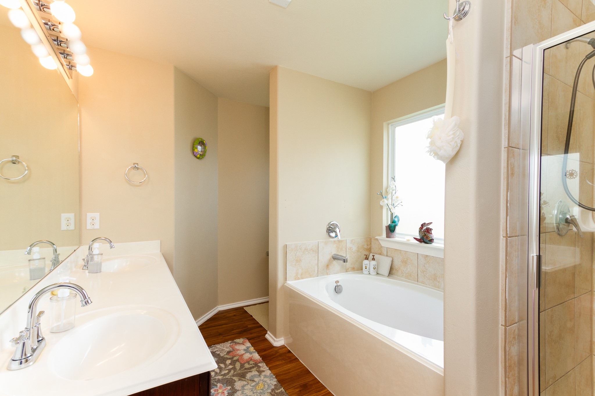 1107 Arum Road Missouri City, TX 77489 - Photo 14 of 23 a bathroom with a tub sink and mirror