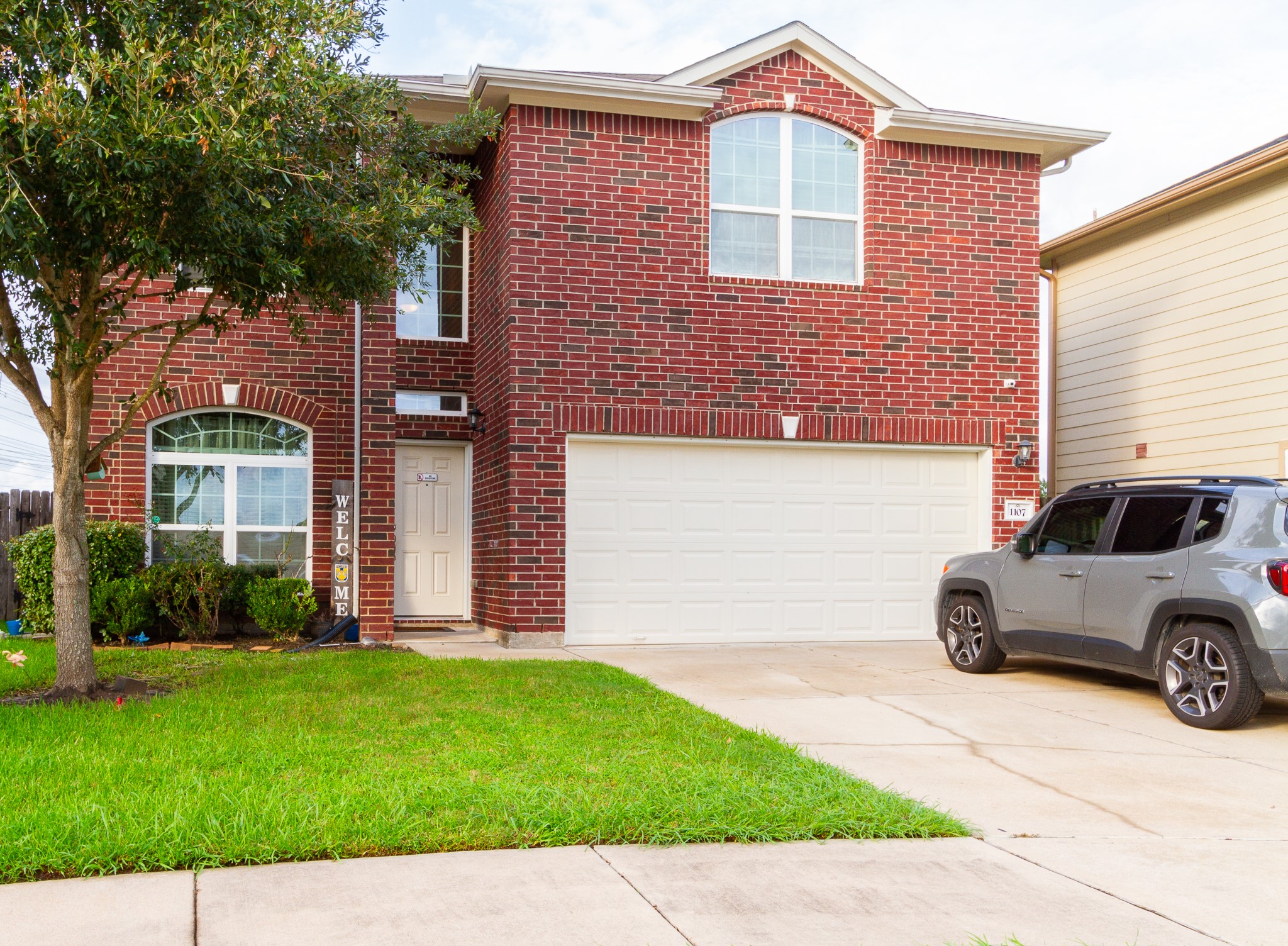 1107 Arum Road Missouri City, TX 77489 - Photo 22 of 23 a front view of a house with a yard