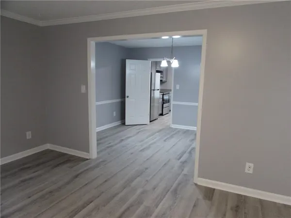 a bathroom with a sink vanity and shower