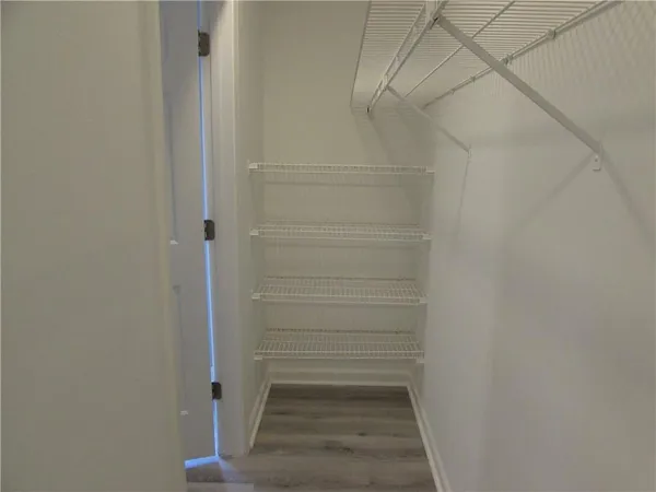 a bathroom with a glass door shower