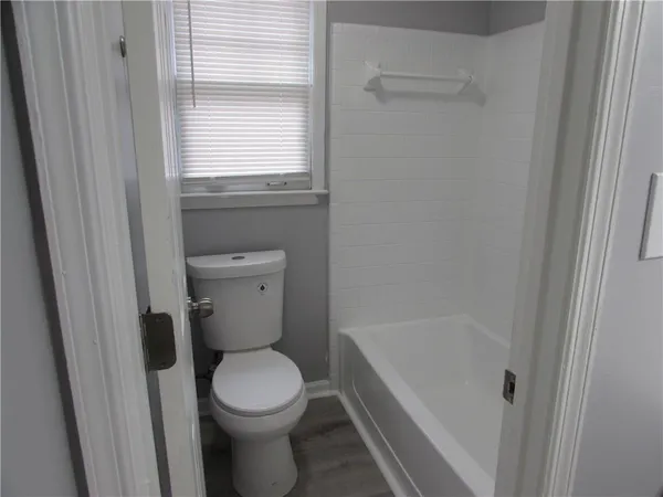 a bathroom with a sink vanity and mirror