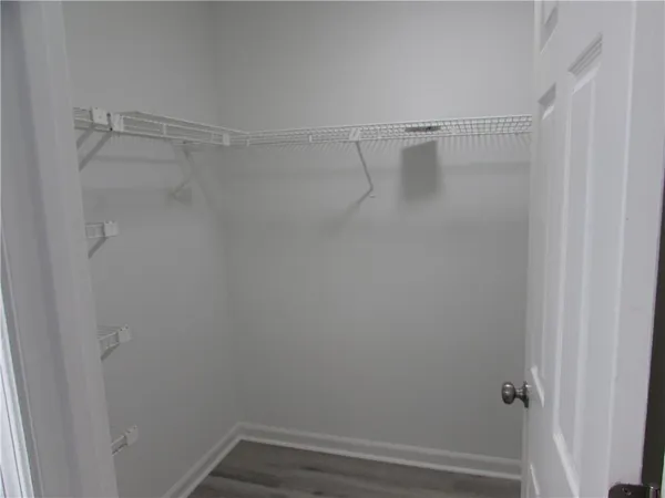 a view of a room with racks on the wall