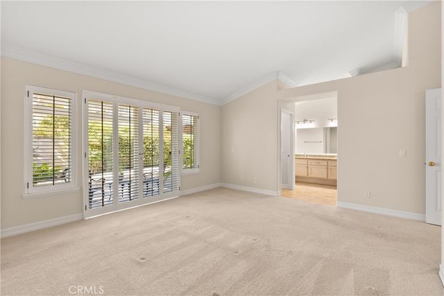 a bathroom with a granite countertop sink and a bathtub