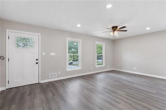 a bathroom with a toilet a sink and a bathtub
