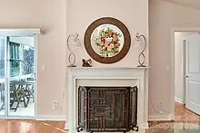 a view of a livingroom with washer and dryer