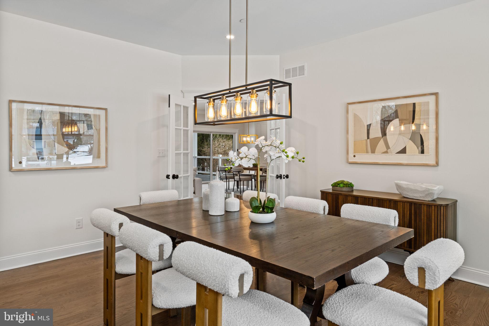 305 Glenway Road Glenside, PA 19038 - Photo 16 of 93 a view of a dining room with furniture and wooden floor