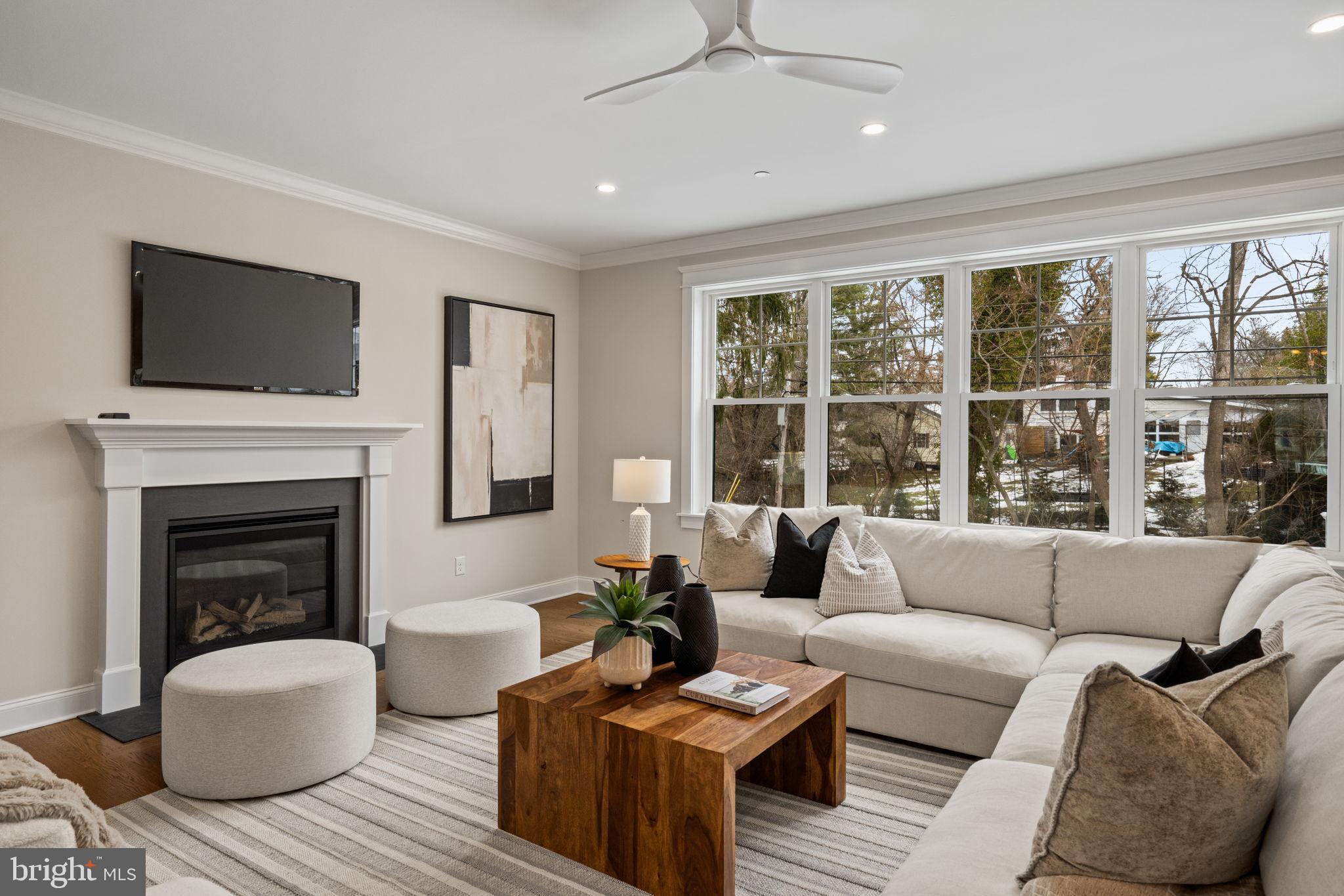 305 Glenway Road Glenside, PA 19038 - Photo 20 of 93 a living room with furniture a fireplace and a flat screen tv