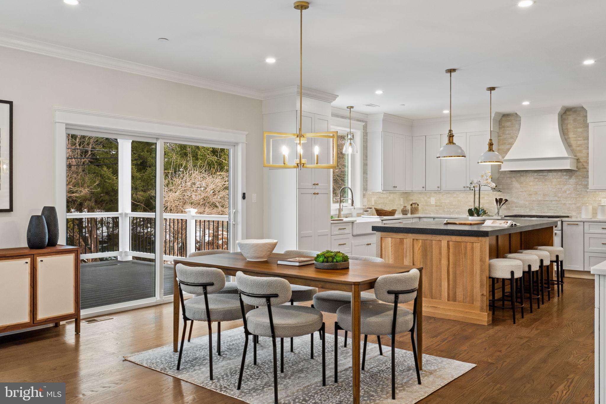 305 Glenway Road Glenside, PA 19038 - Photo 24 of 93 a view of a dining room with furniture a kitchen and chandelier