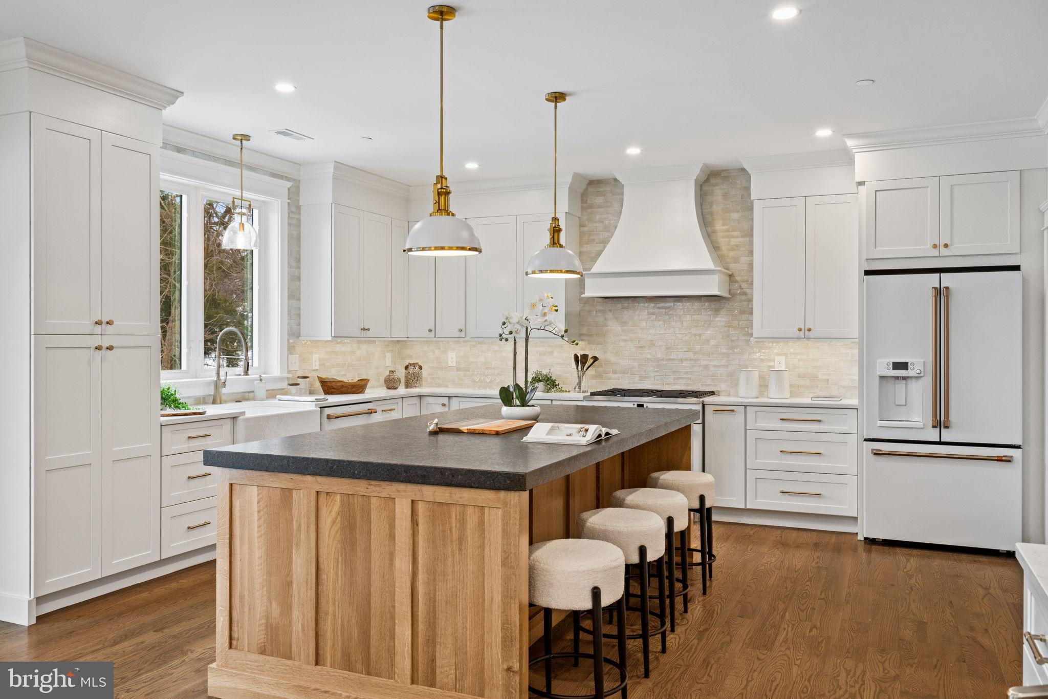 305 Glenway Road Glenside, PA 19038 - Photo 27 of 93 a kitchen with stainless steel appliances granite countertop a sink stove and refrigerator