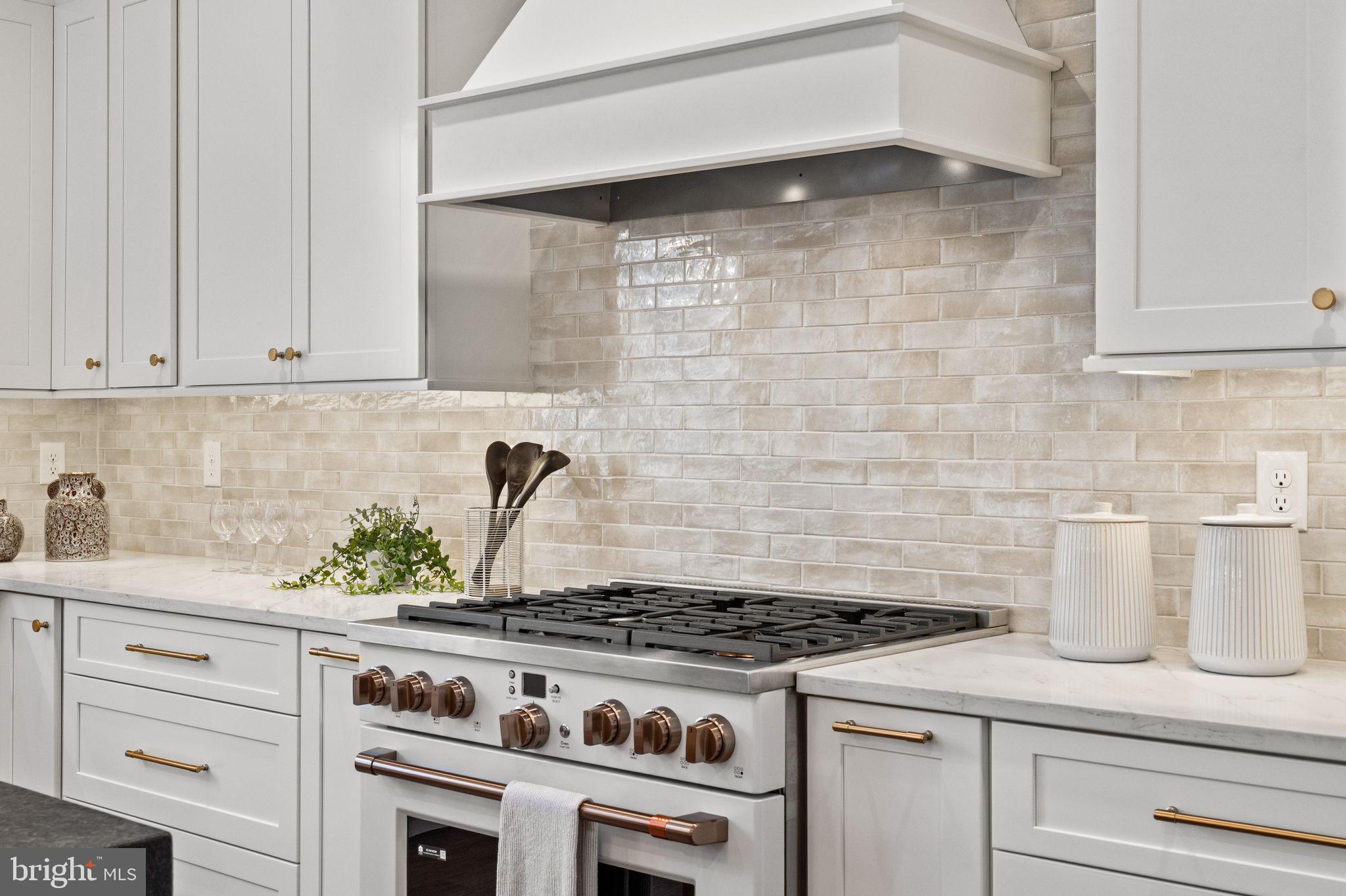 305 Glenway Road Glenside, PA 19038 - Photo 30 of 93 a stove top oven sitting inside of a kitchen