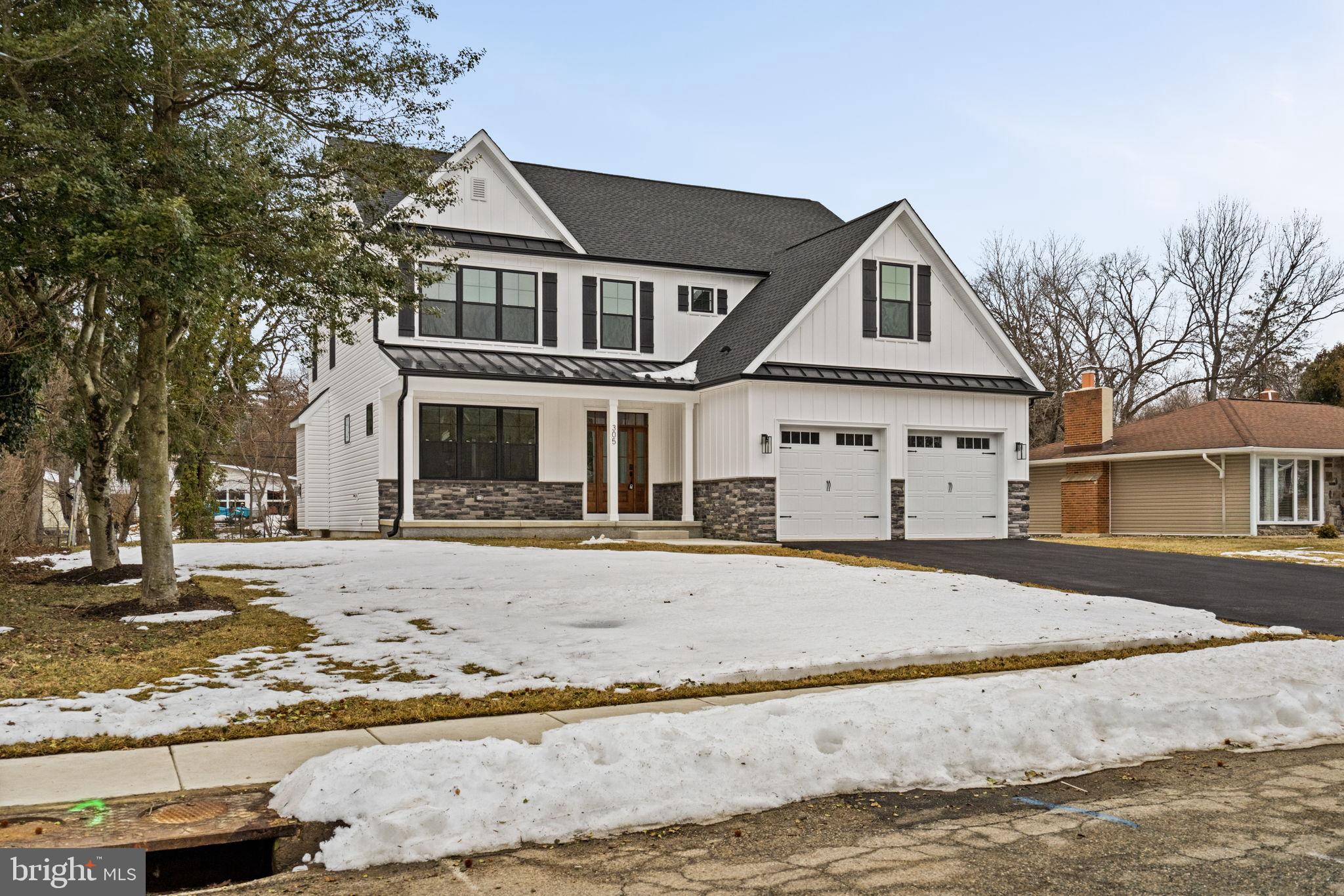 305 Glenway Road Glenside, PA 19038 - Photo 3 of 93 front view of a house with a snow on the road
