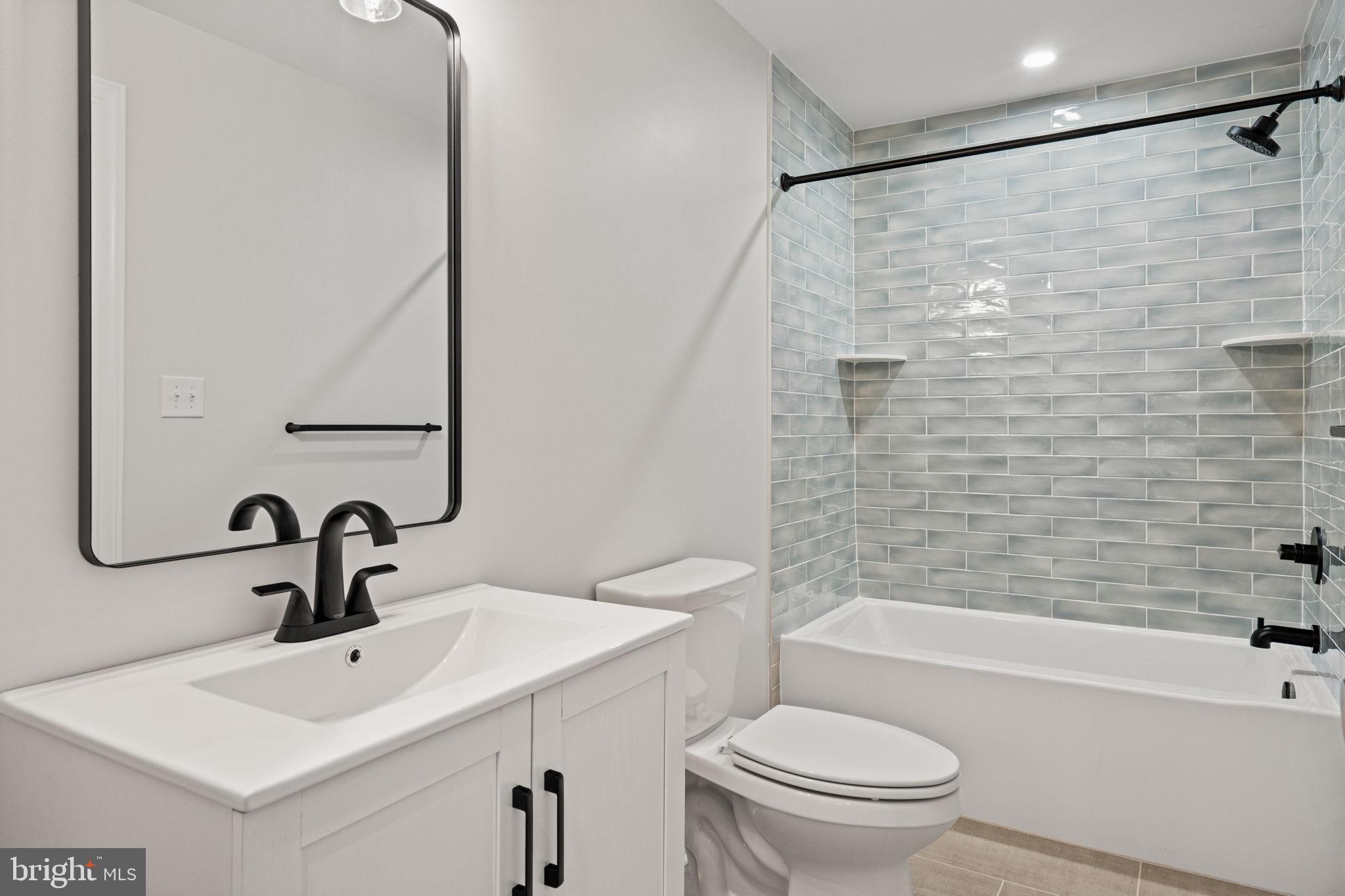 305 Glenway Road Glenside, PA 19038 - Photo 44 of 93 a bathroom with a sink a toilet and a bathtub