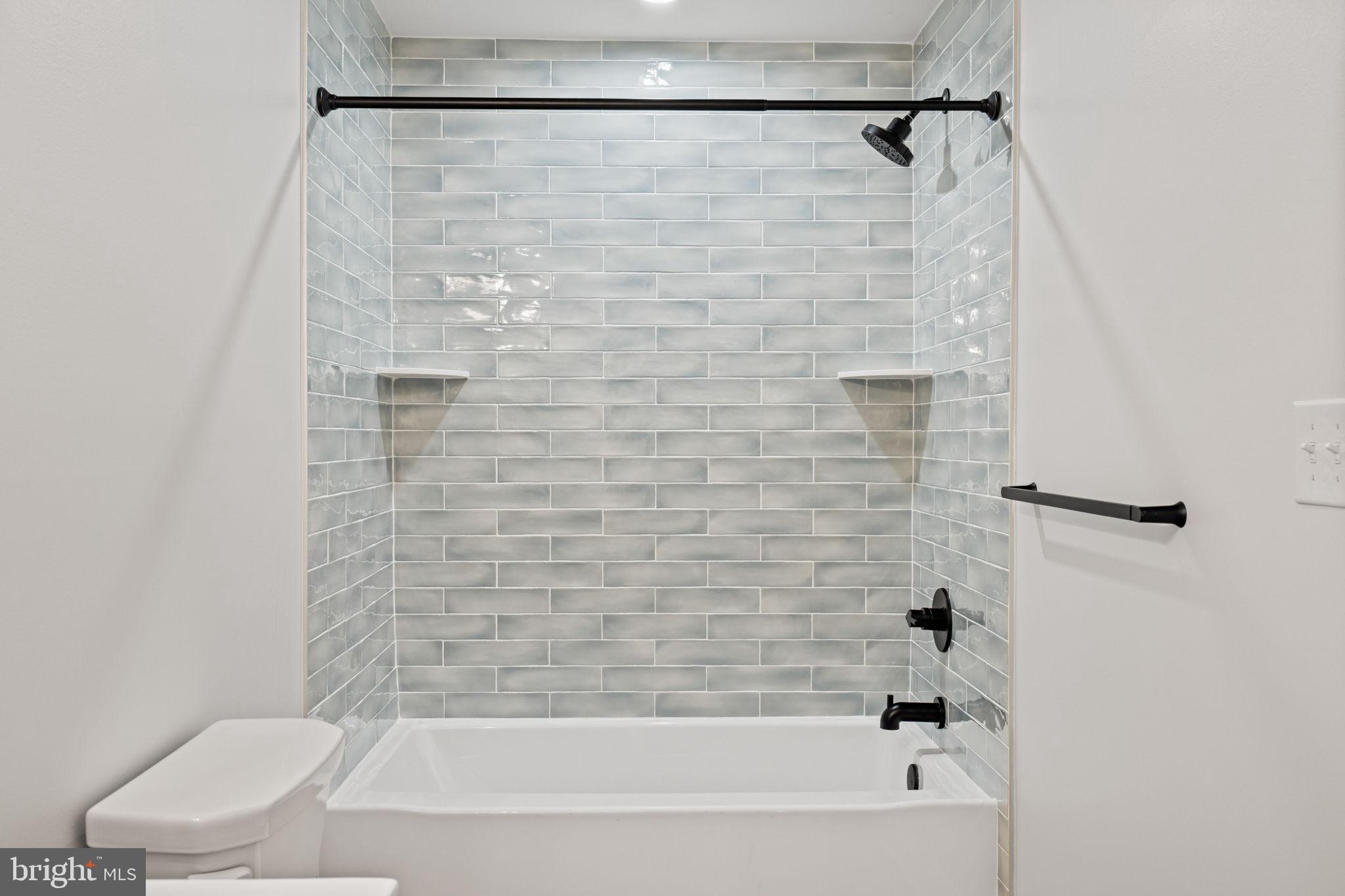 305 Glenway Road Glenside, PA 19038 - Photo 45 of 93 a bathroom with a bathtub and a shower
