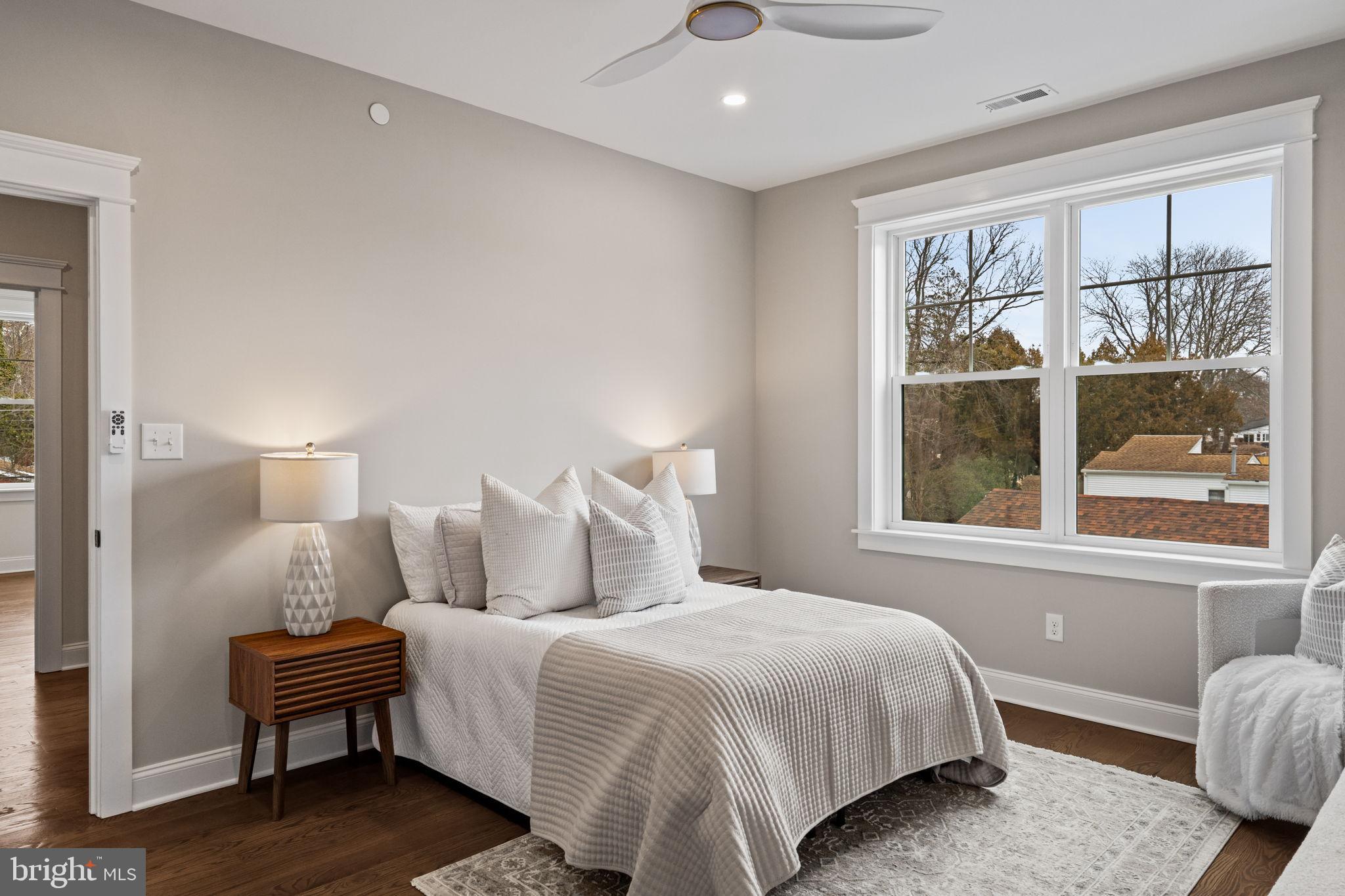 305 Glenway Road Glenside, PA 19038 - Photo 61 of 93 a bedroom with a bed and wooden floor