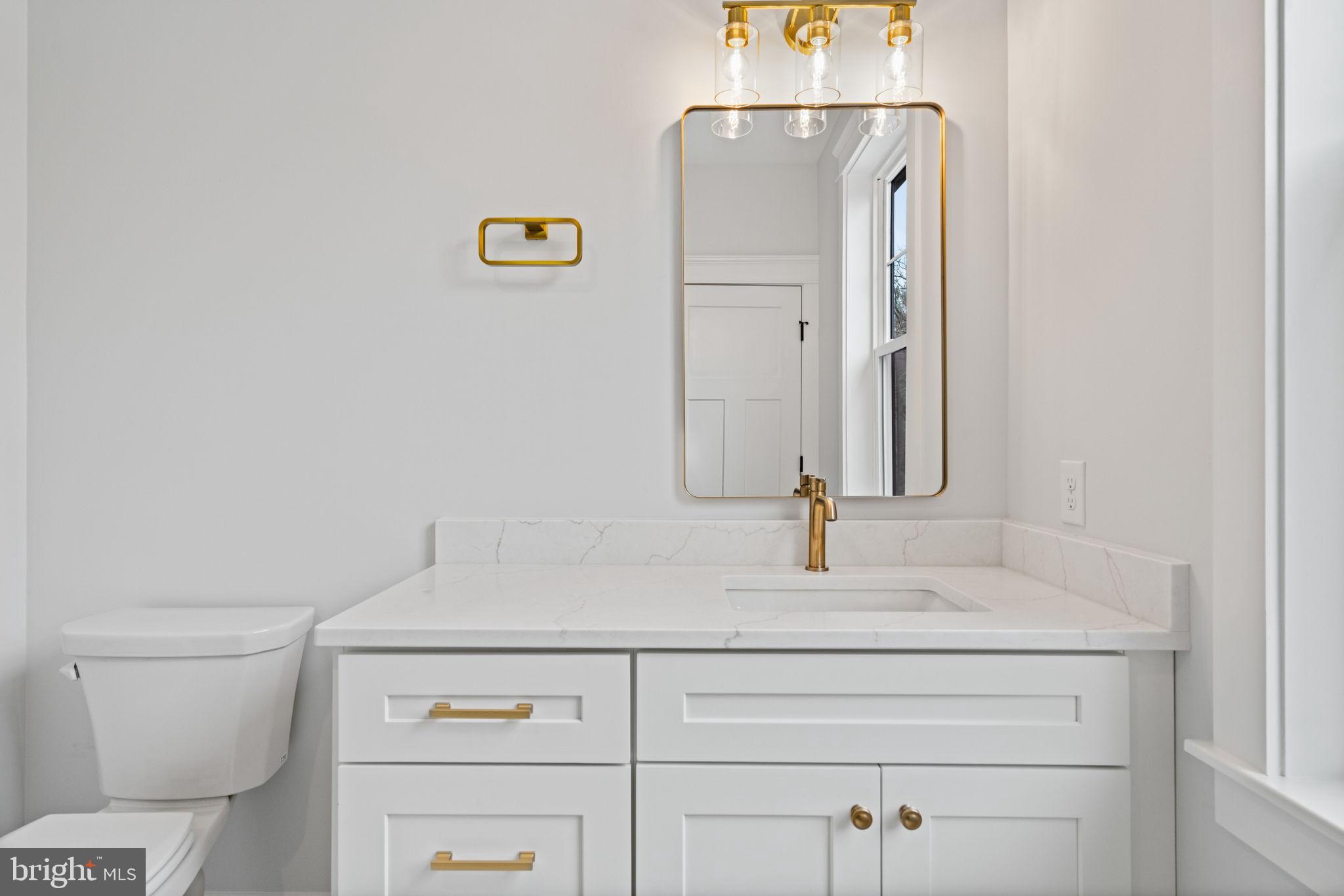 305 Glenway Road Glenside, PA 19038 - Photo 70 of 93 a bathroom with a sink and a mirror