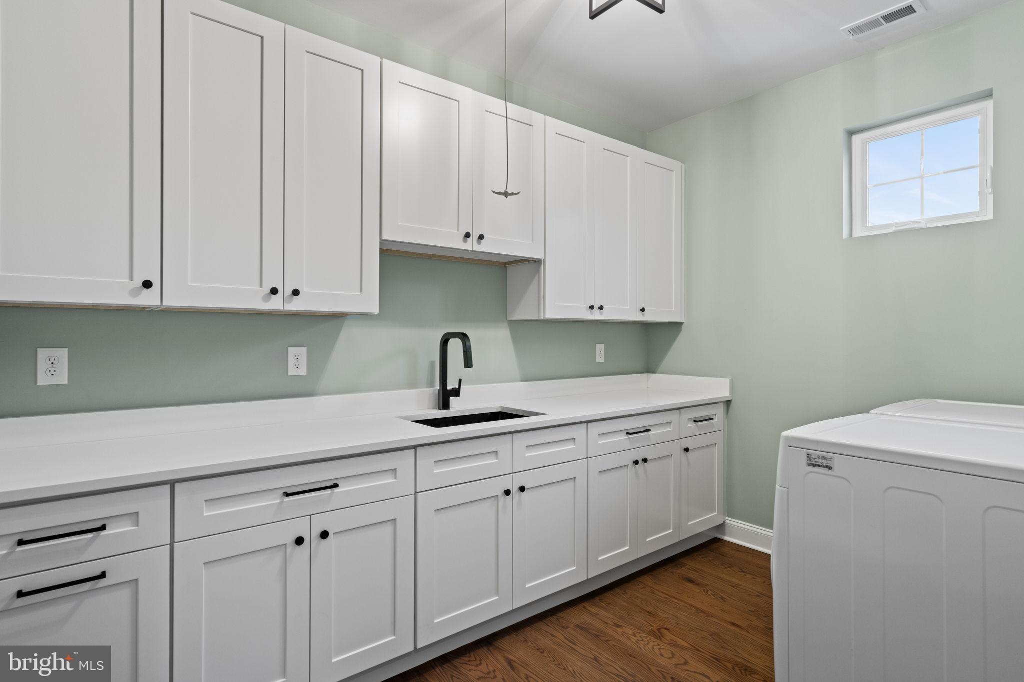 305 Glenway Road Glenside, PA 19038 - Photo 87 of 93 a kitchen with white cabinets and sink
