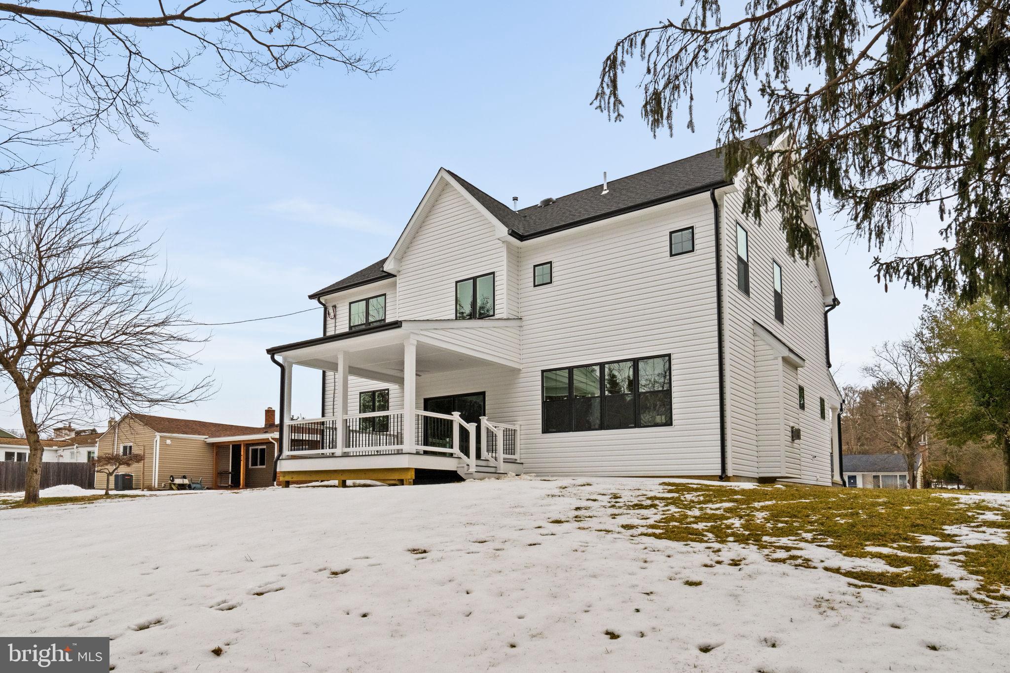 305 Glenway Road Glenside, PA 19038 - Photo 92 of 93 a front view of a house with a dirt yard