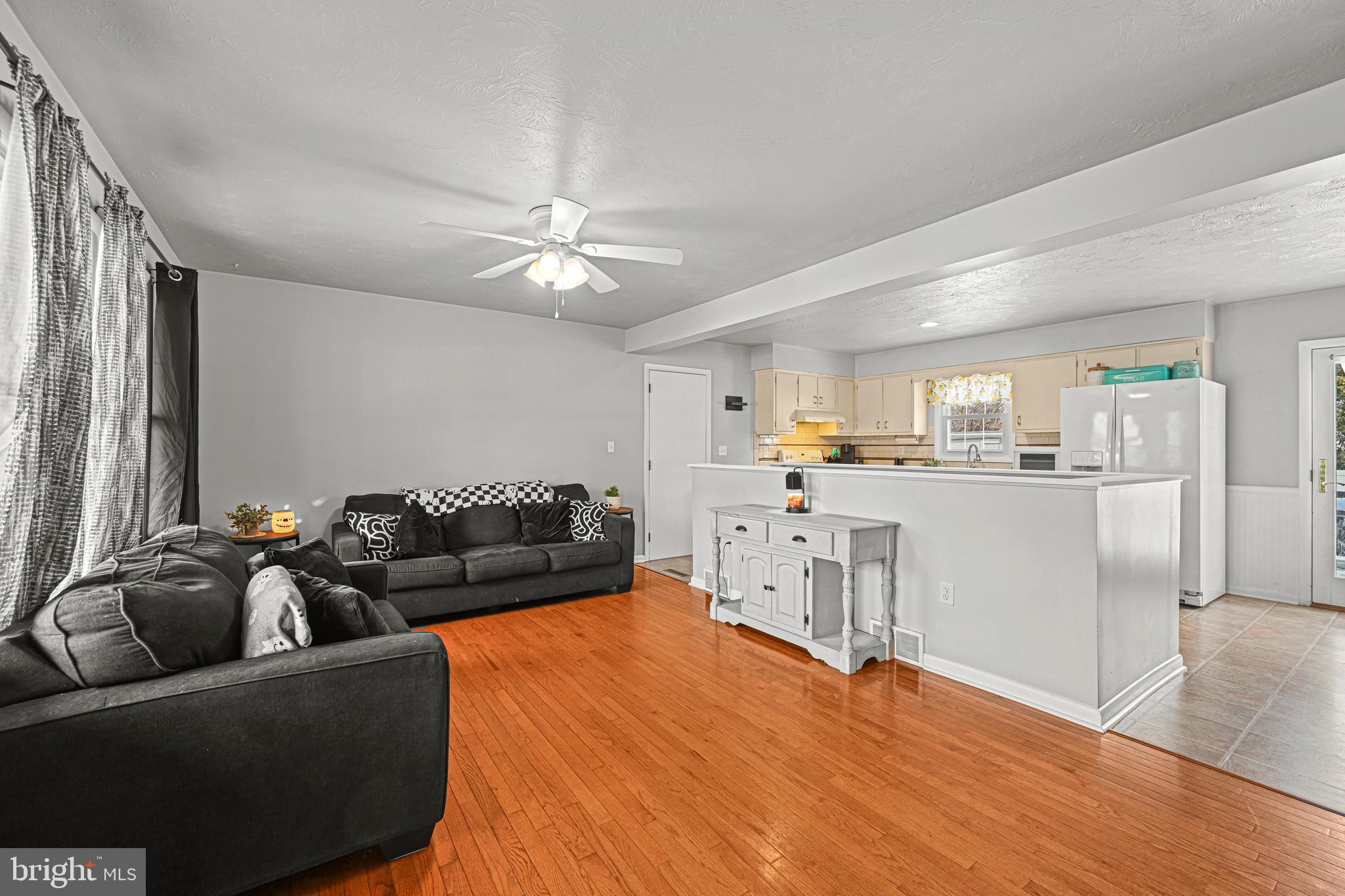 3541 Village Road Dover, PA 17315 - Photo 2 of 36 a living room with furniture and kitchen view
