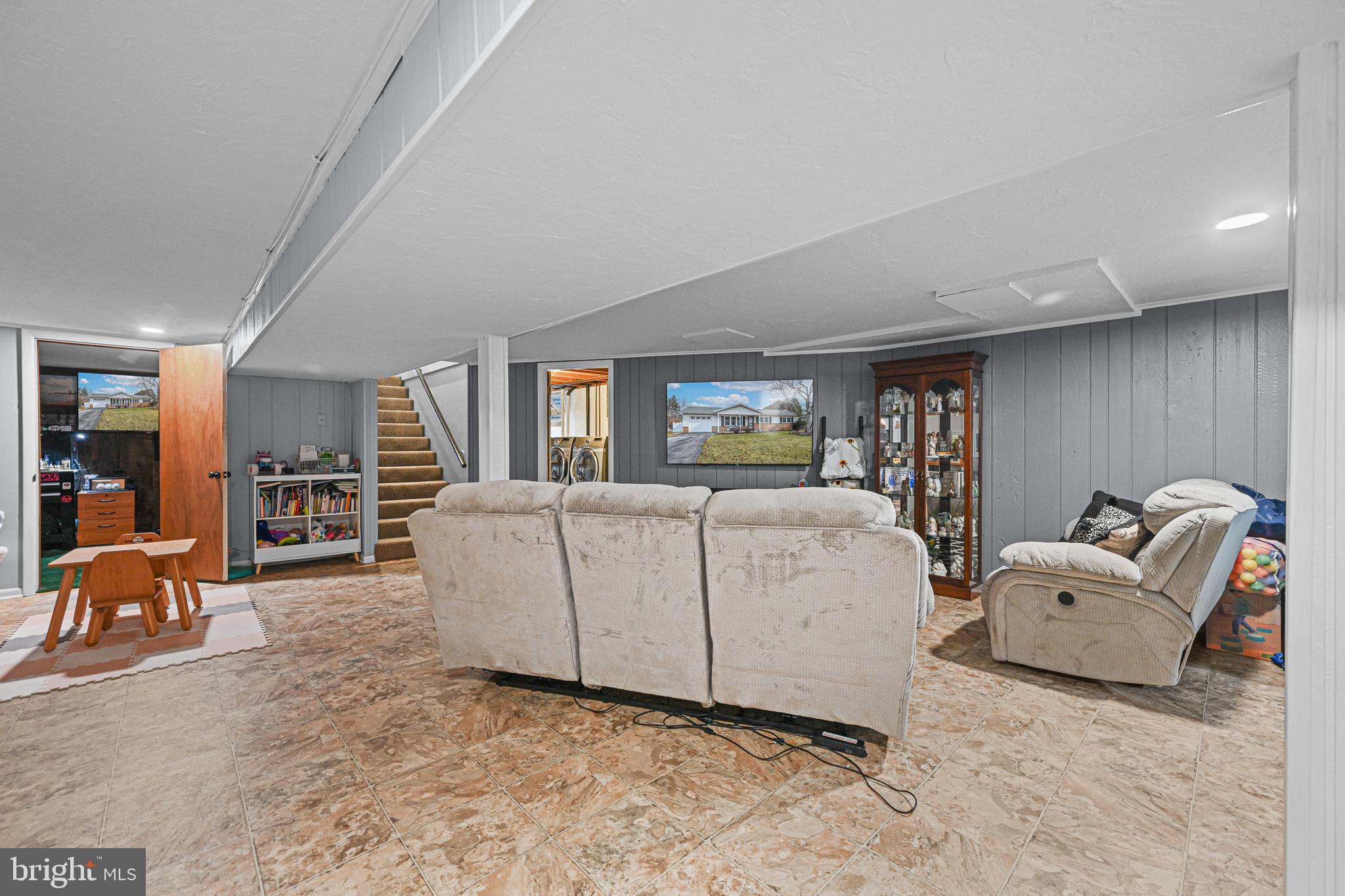 3541 Village Road Dover, PA 17315 - Photo 21 of 36 a living room with furniture and a large window