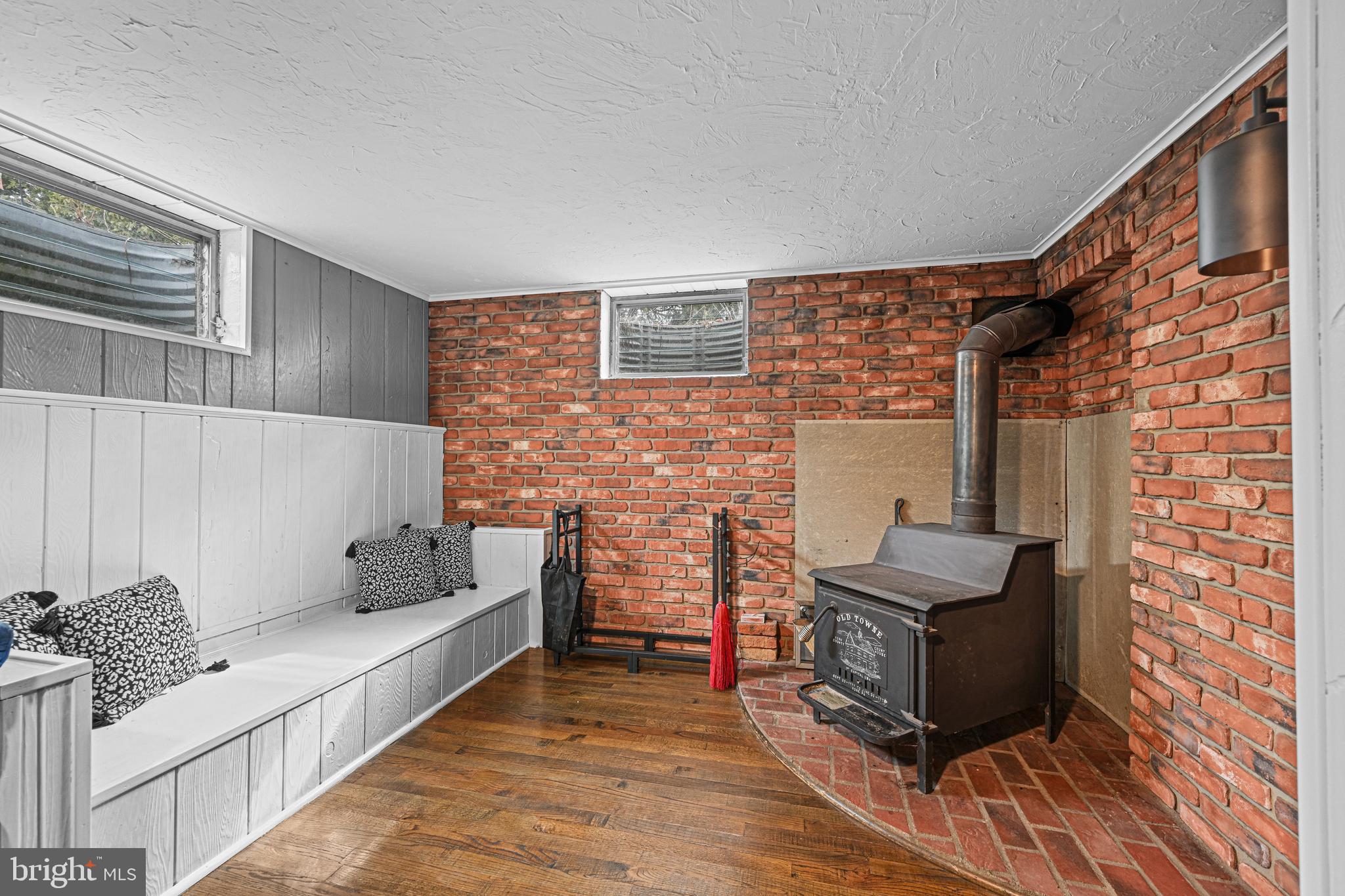 3541 Village Road Dover, PA 17315 - Photo 22 of 36 a living room with furniture and a fireplace