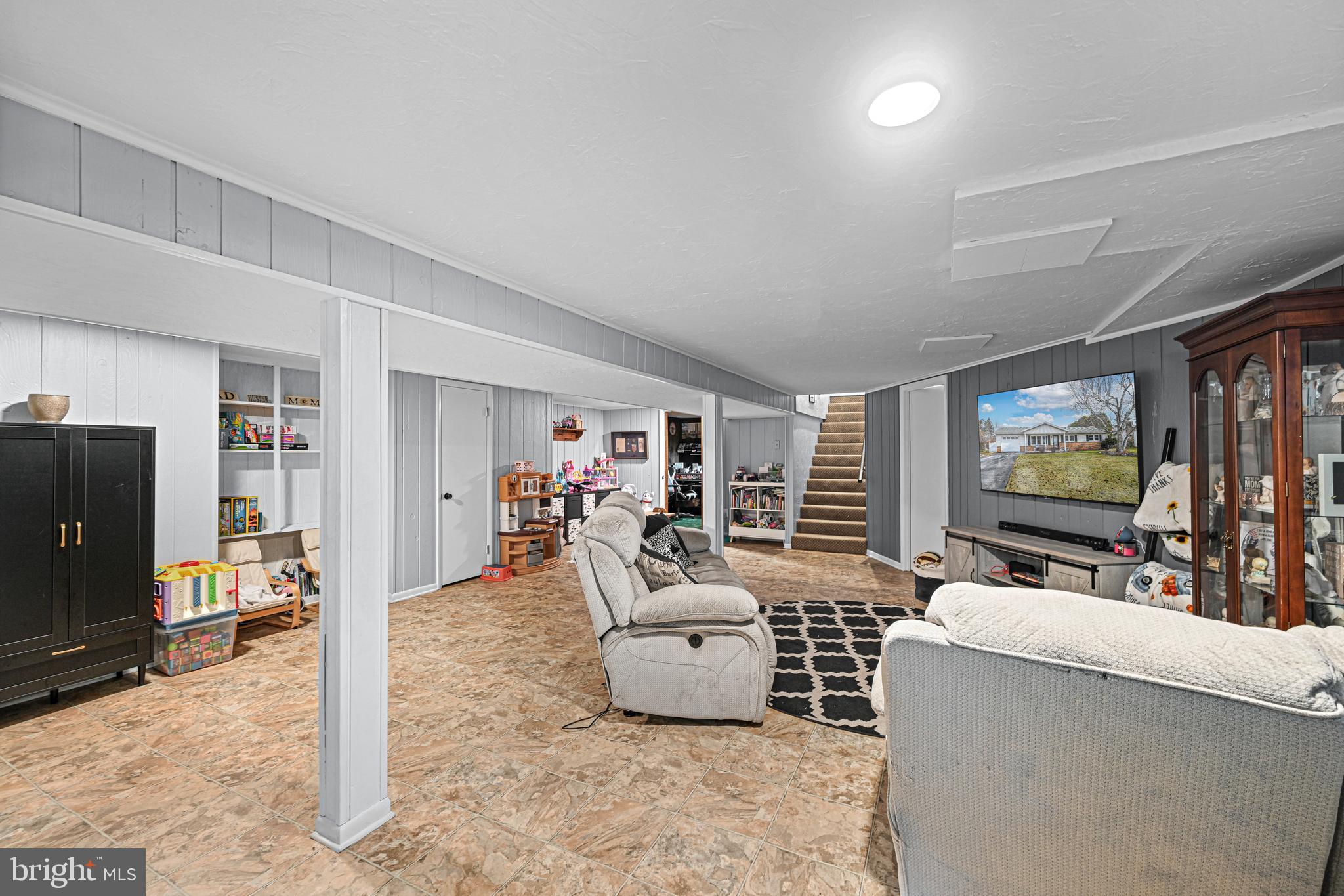3541 Village Road Dover, PA 17315 - Photo 23 of 36 a living room with furniture and a flat screen tv