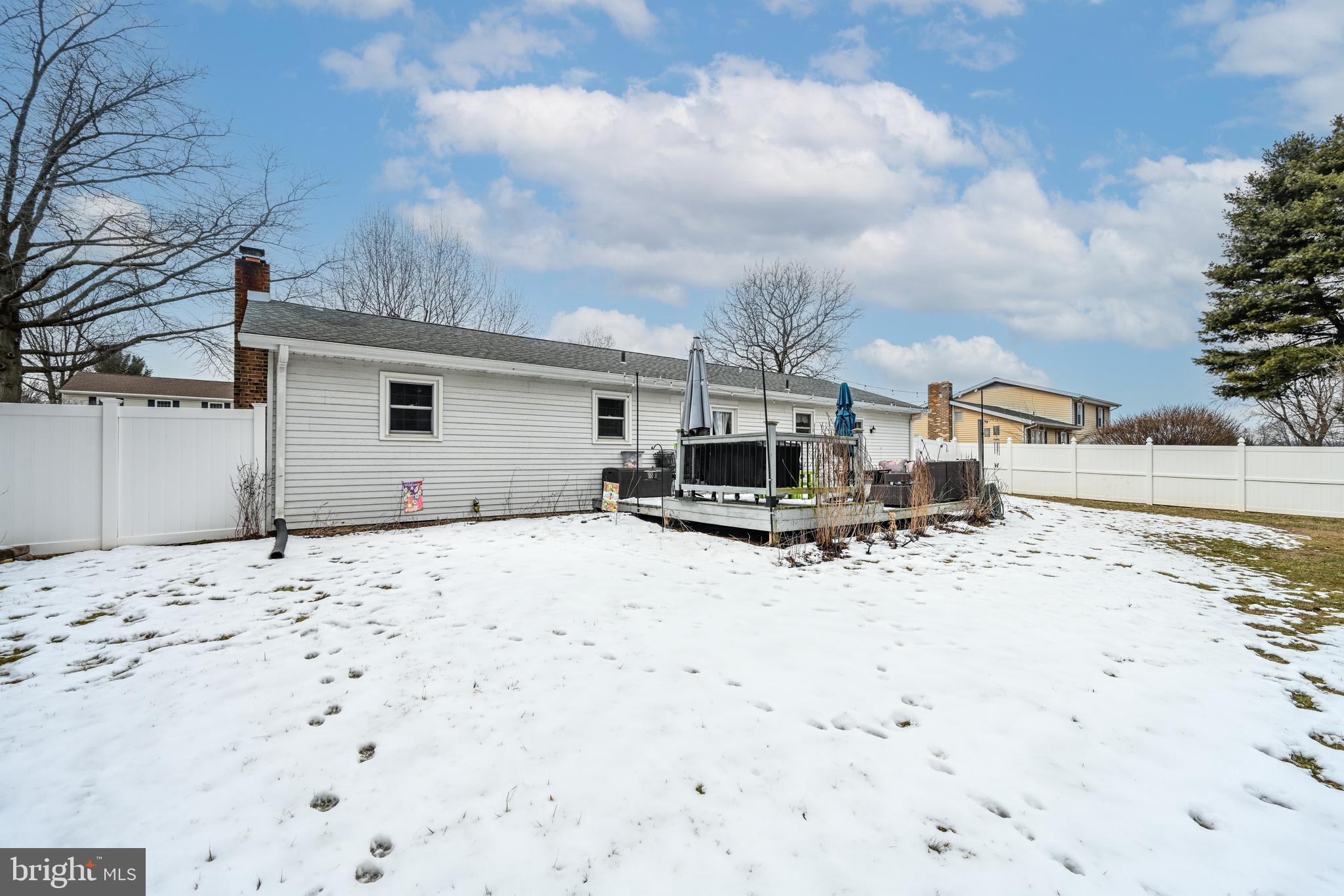 3541 Village Road Dover, PA 17315 - Photo 27 of 36 a view of a backyard with a barbeque