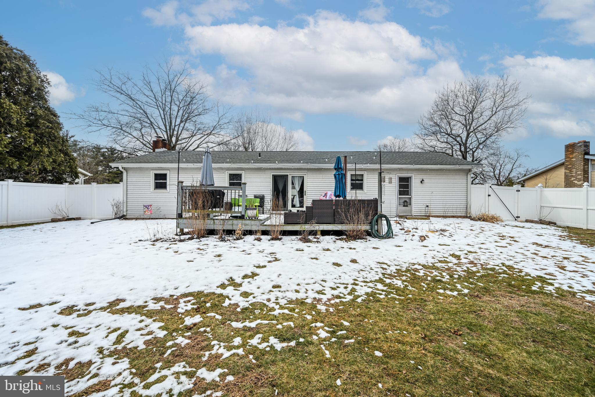 3541 Village Road Dover, PA 17315 - Photo 28 of 36 a front view of a house with a yard covered in snow