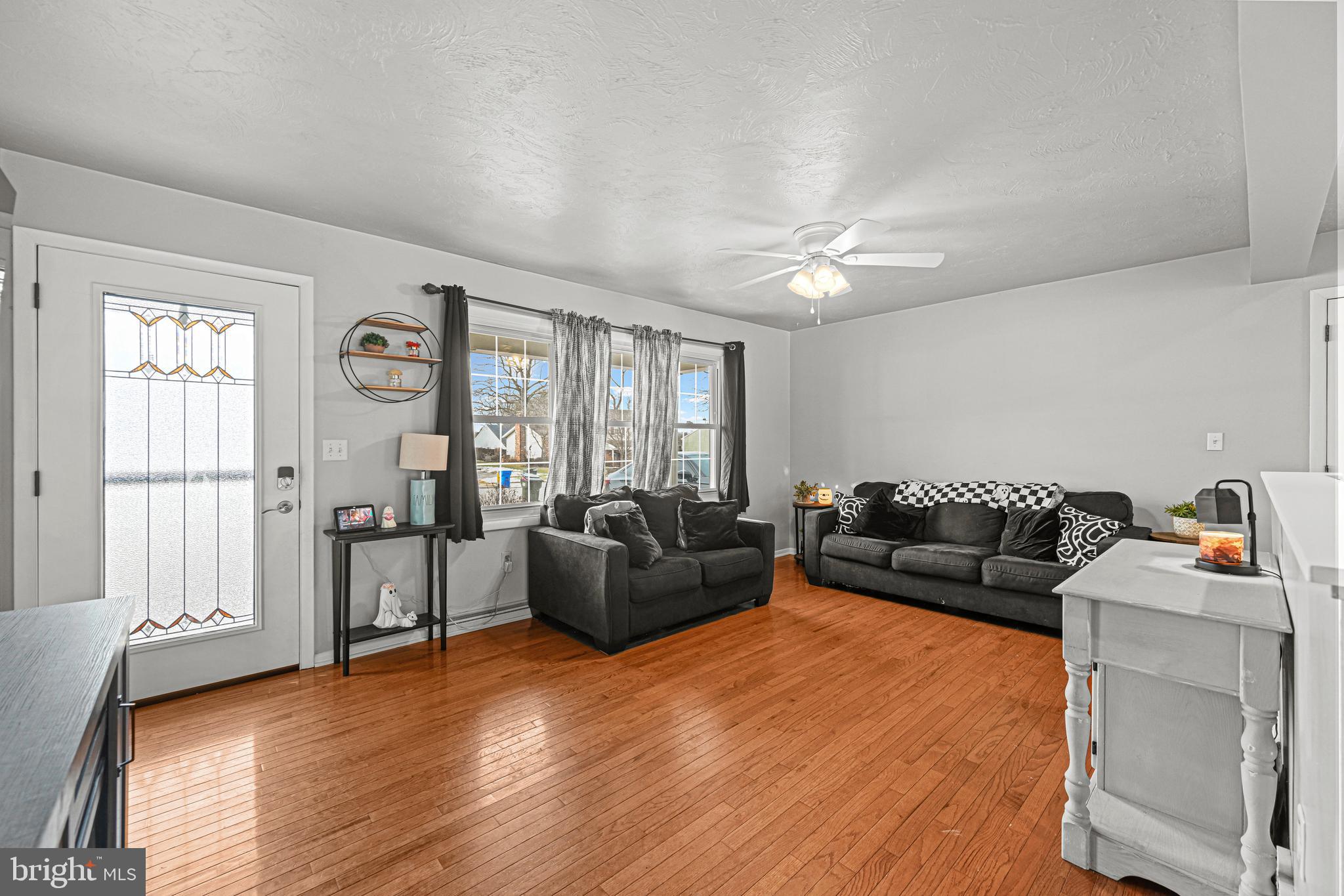 3541 Village Road Dover, PA 17315 - Photo 3 of 36 a living room with furniture and a large window