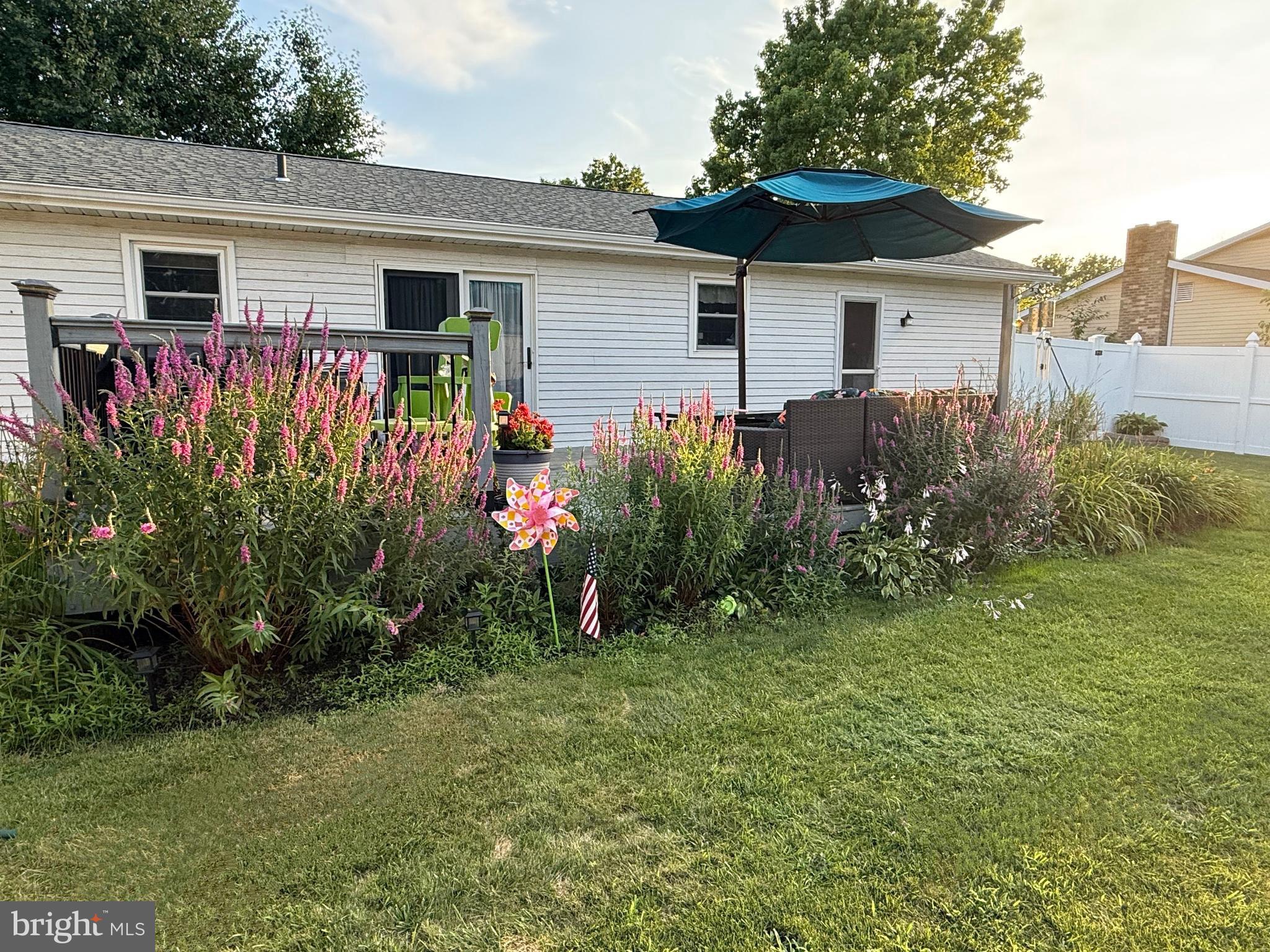 3541 Village Road Dover, PA 17315 - Photo 31 of 36 a view of a house with a yard and plants