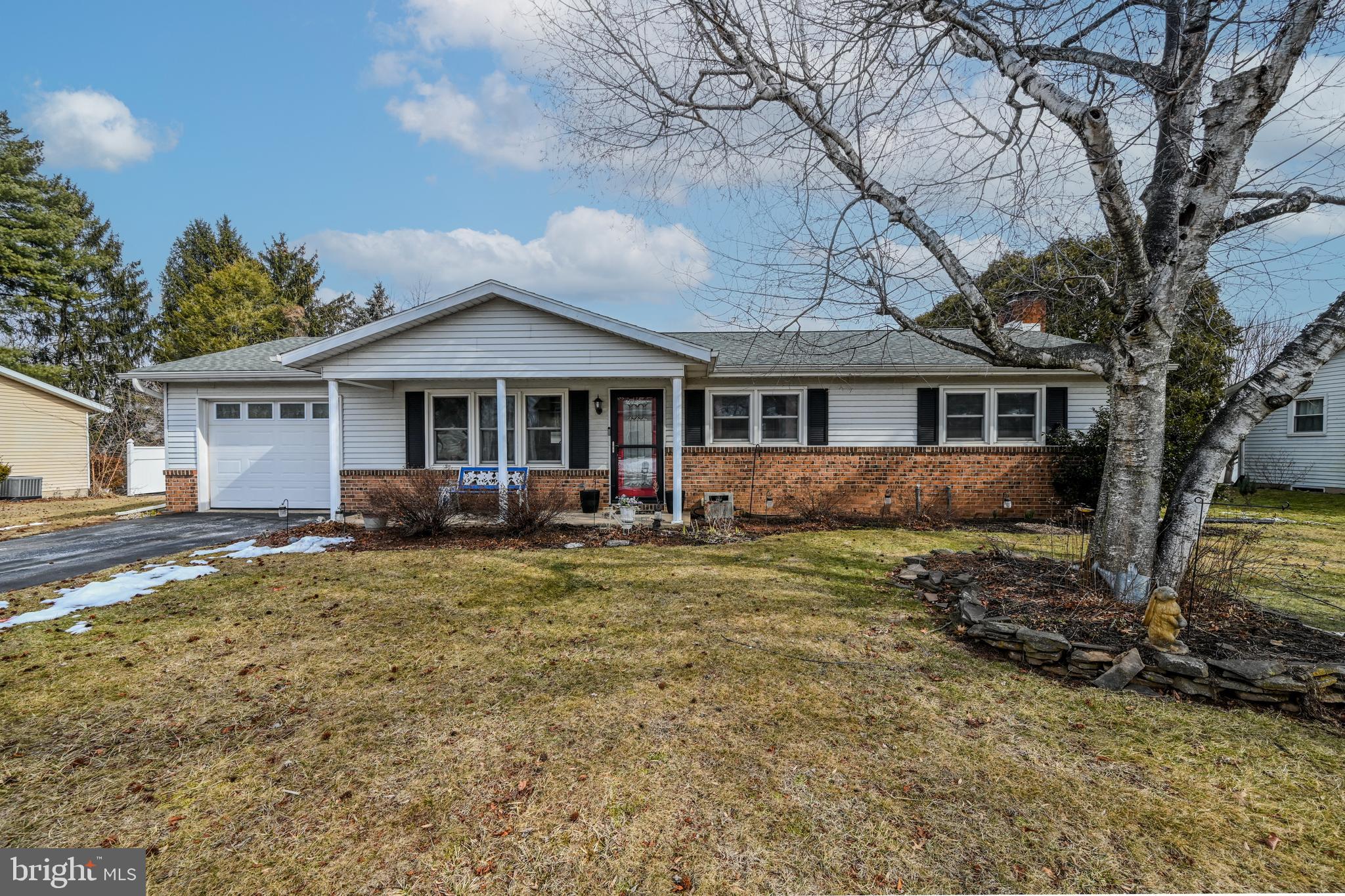 3541 Village Road Dover, PA 17315 - Photo 36 of 36 a front view of a house with yard porch and outdoor seating