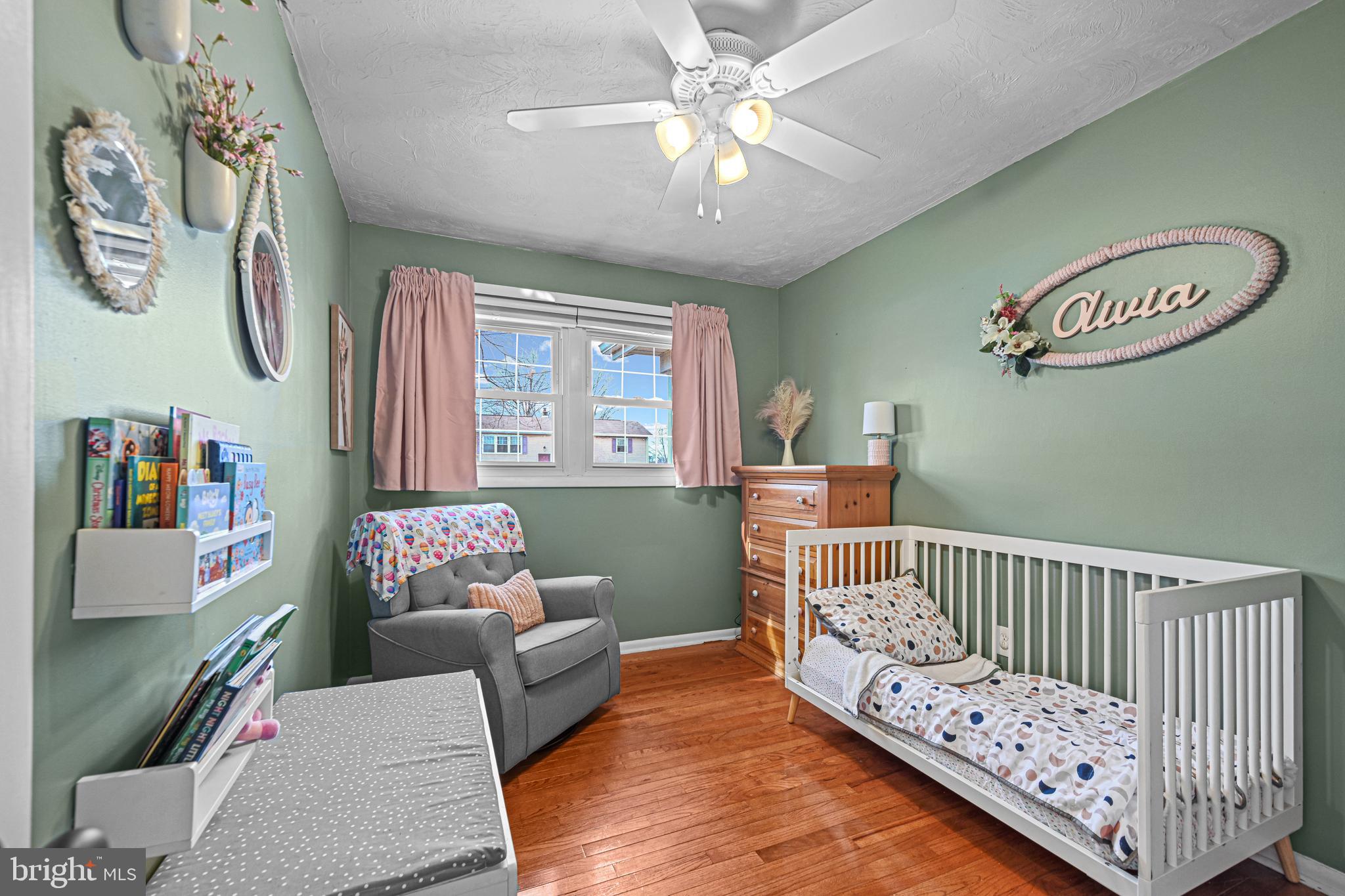 3541 Village Road Dover, PA 17315 - Photo 10 of 36 a bedroom with furniture and a wooden floor