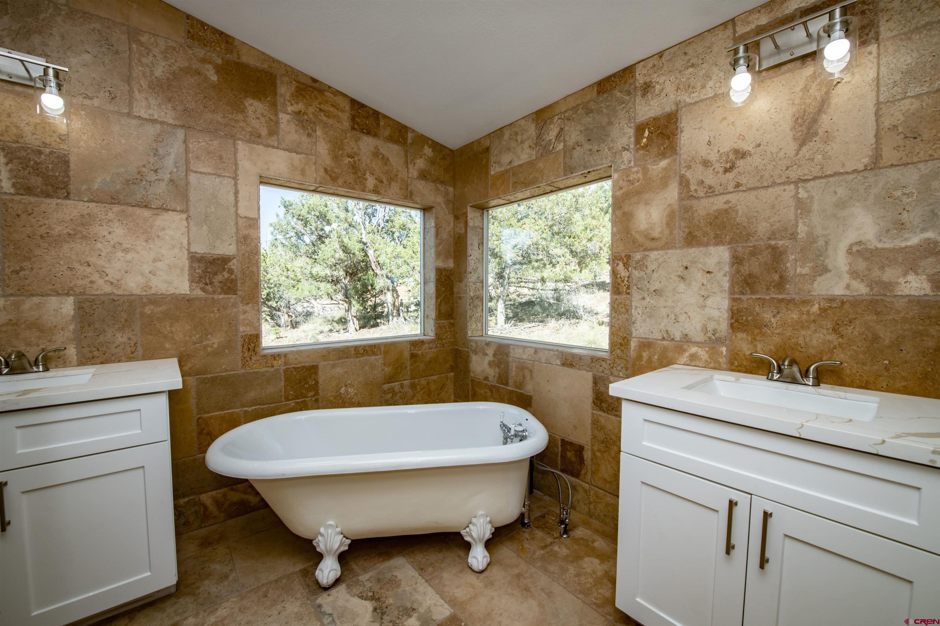 475 Run Around Road Arboles, CO 81121 - Photo 20 of 40 a bathroom with a sink and a toilet